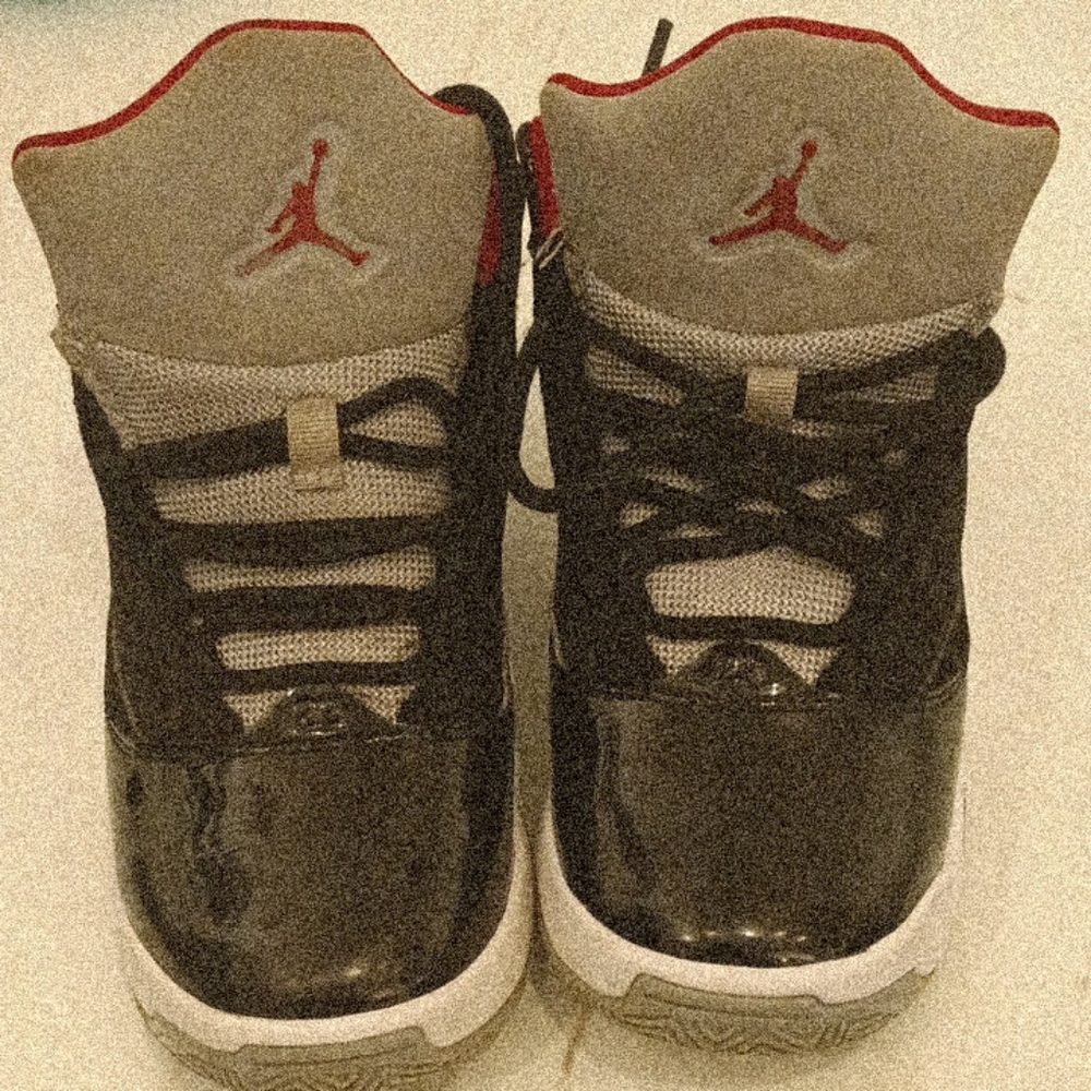 Jordan Black and Gray High-Top Sneakers with Iconic Jumpman